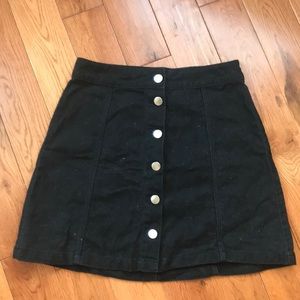 H&M Divided black button down cord skirt.